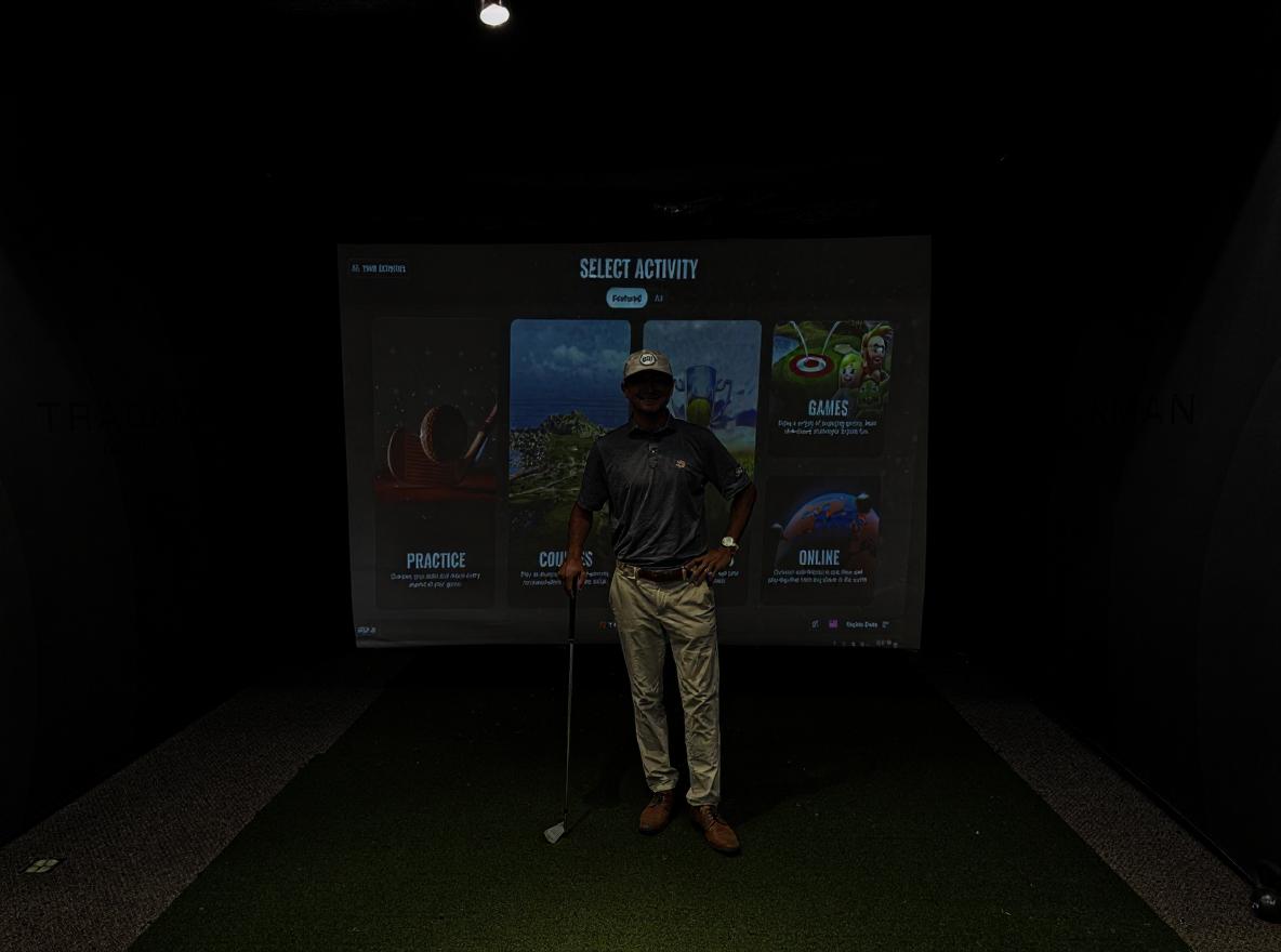 Professional golf coaching session